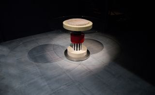 A table made out of eight different stacked materials