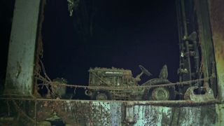 An international harvester aircraft tug sits upright, even after spending decades at the bottom of the South Pacific.