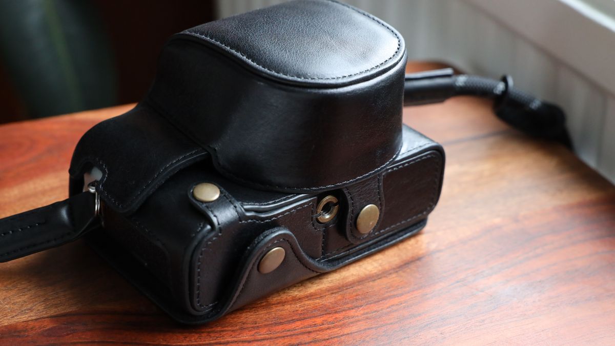 Fujifilm X100VI camera on a wooden table
