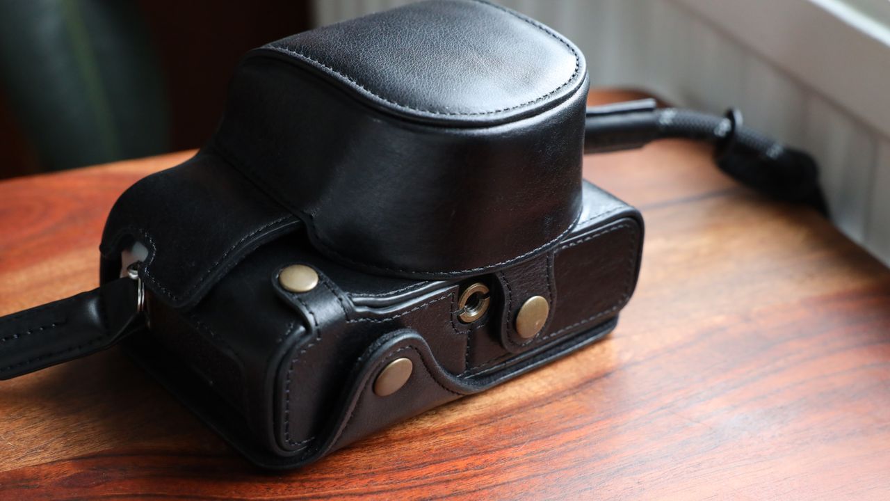 Fujifilm X100VI camera on a wooden table
