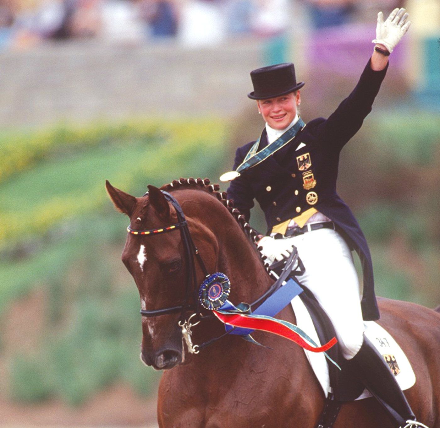 03-AUG-96 ... Atlanta Olympic Games .... Dressage - Equestrian ..... Germany's Isabelle Werth celebrates her gold medal on Gigolo