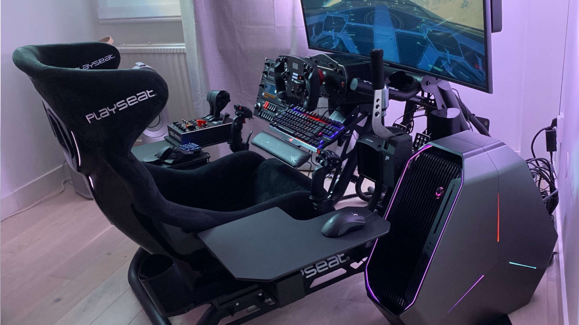 This gaming setup is the ultimate flight and racing sim battlestation ...