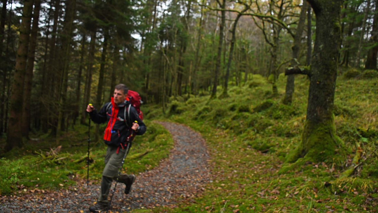 Author Pat Kinsella hiking in full outdoor gear