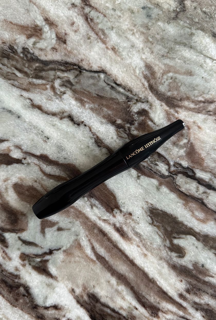Lancome Hypnose mascara on a marble surface