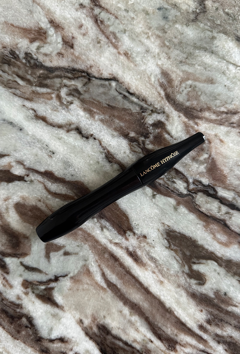 Lancome Hypnose mascara on a marble surface