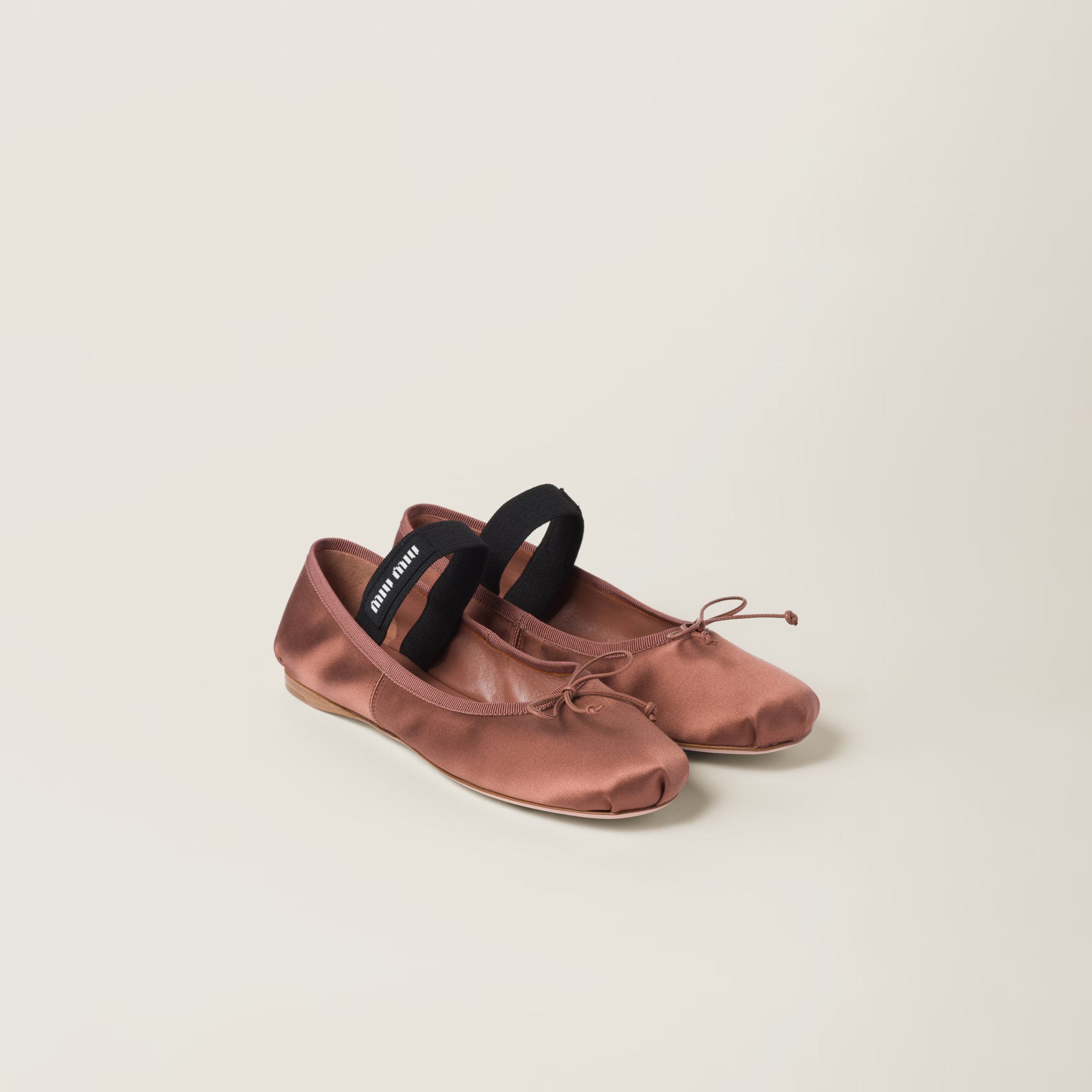 An image of MIu Miu Satin Ballet flats.