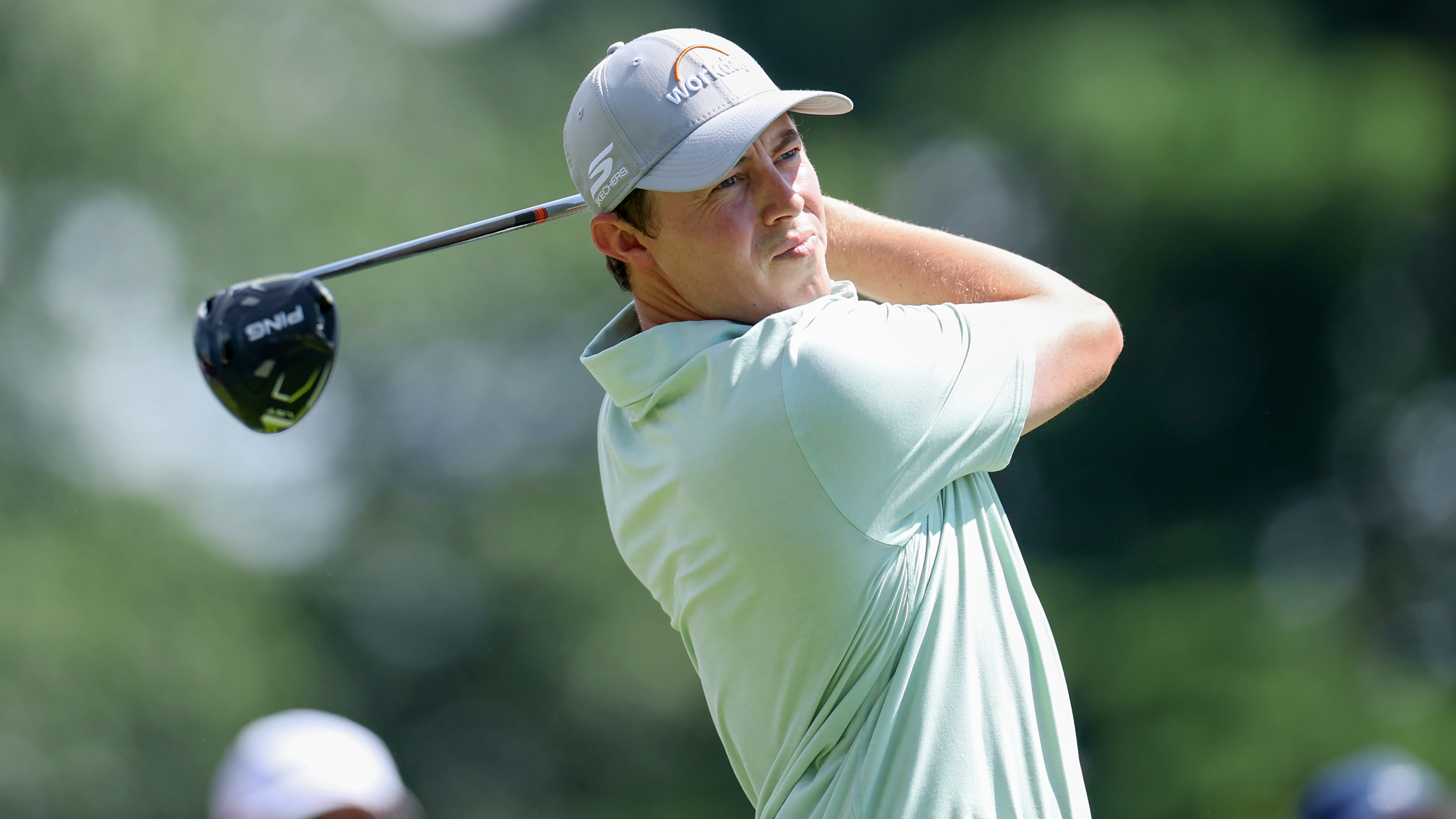 Matt Fitzpatrick holds his finish on a driver shot
