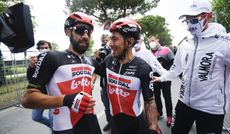 Caleb Ewan and Thomas De Gendt celebrate stage victory at the Giro d'Italia 2021
