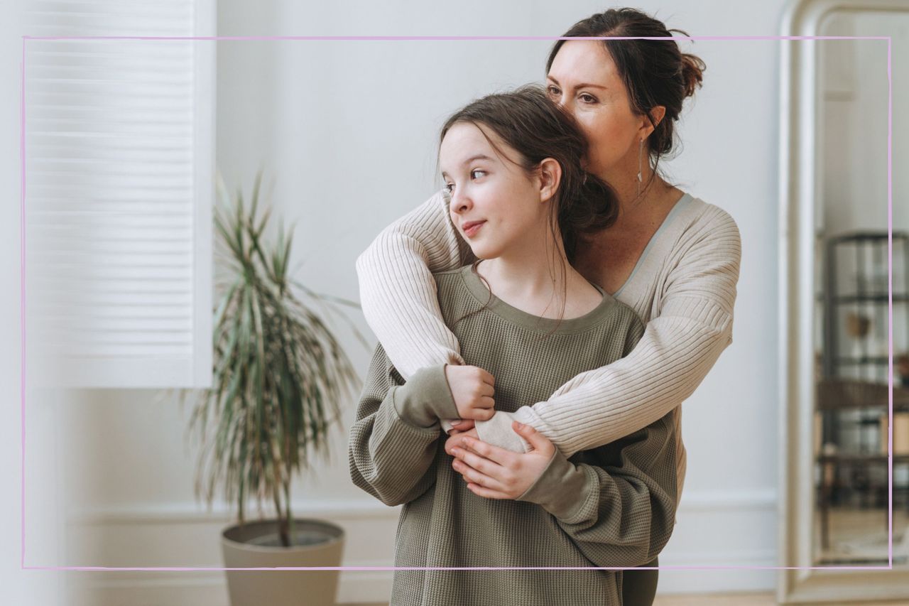 Mother comforting her teenage daughter