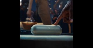 Beats Pill speaker shown in Beats by Dre X teaser. Lebron Jame's finger turns up the volume on the speaker