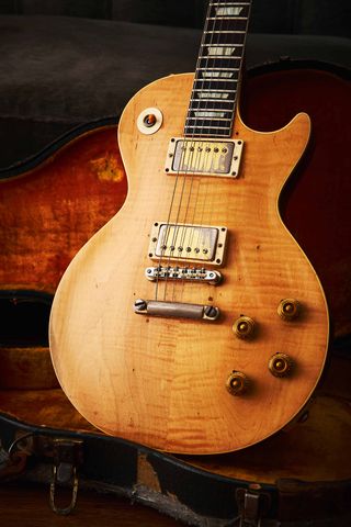 The natural tint of the refinish shows the figuring of the top off. Interestingly, there is also evidence that a Bigsby B7 vibrato was originally fitted to the guitar.