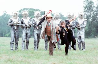 Tales of the TARDIS stars Sylvester McCoy and Sophie Aldred running from Cybermen