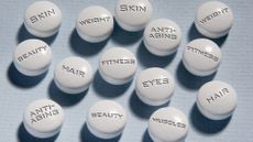 White pills with beauty related words including skin, beauty, hair and anti-aging