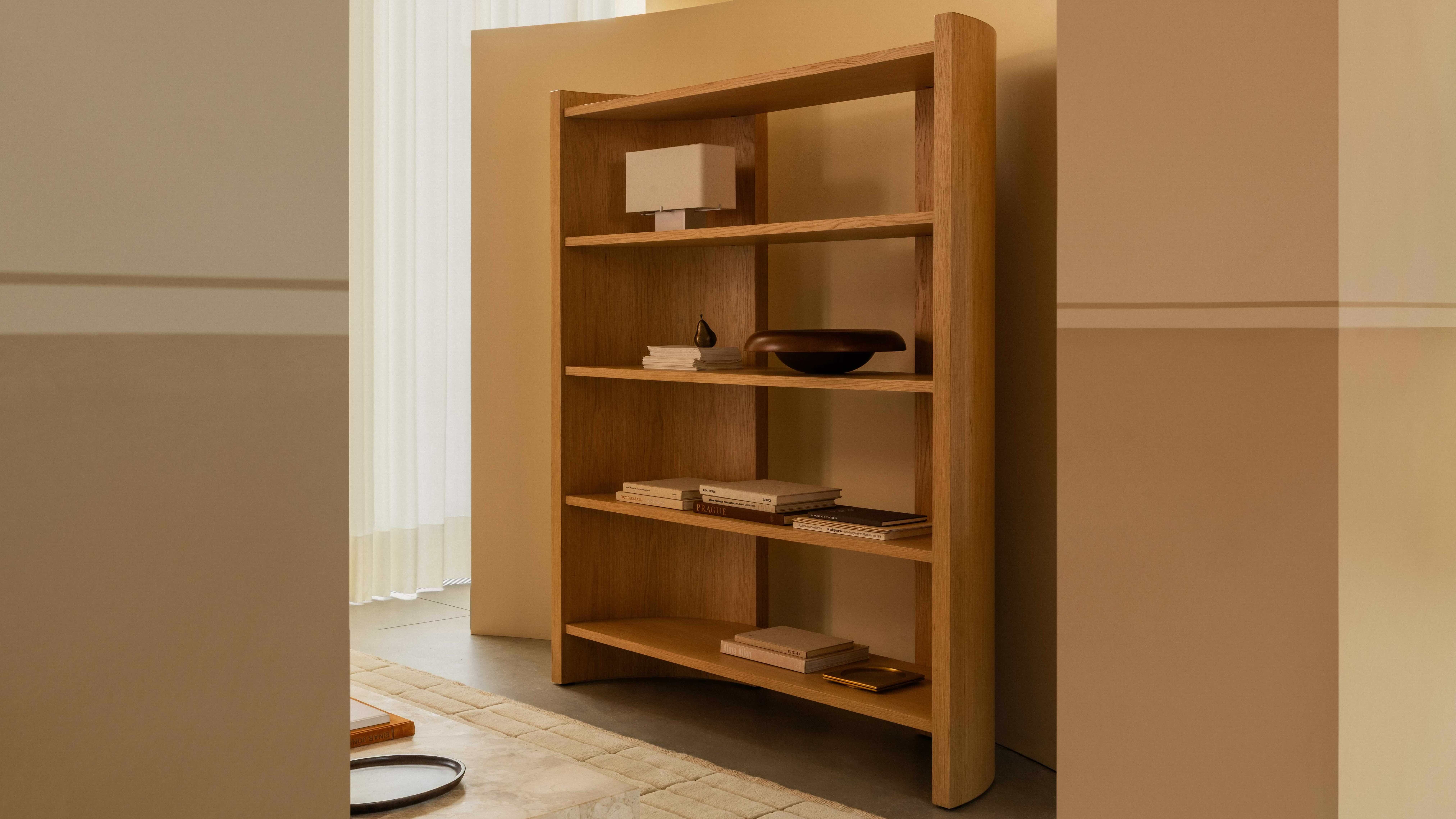 freestanding shelving unit in oak in a neutral interior