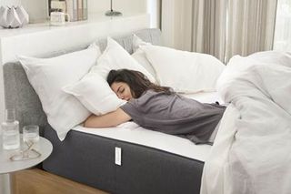 Casper Hybrid Mattress and woman lying in bed