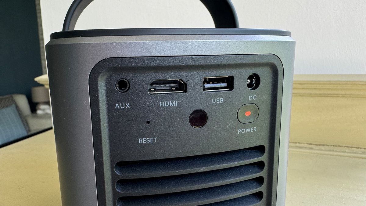 The rear of an Anker Nebula Mars 3 Air portable projector. Connections including an HDMI port and USB port are visible.