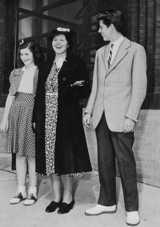 Rosemary (center), with sister Jean and brother Jack, circa 1940.