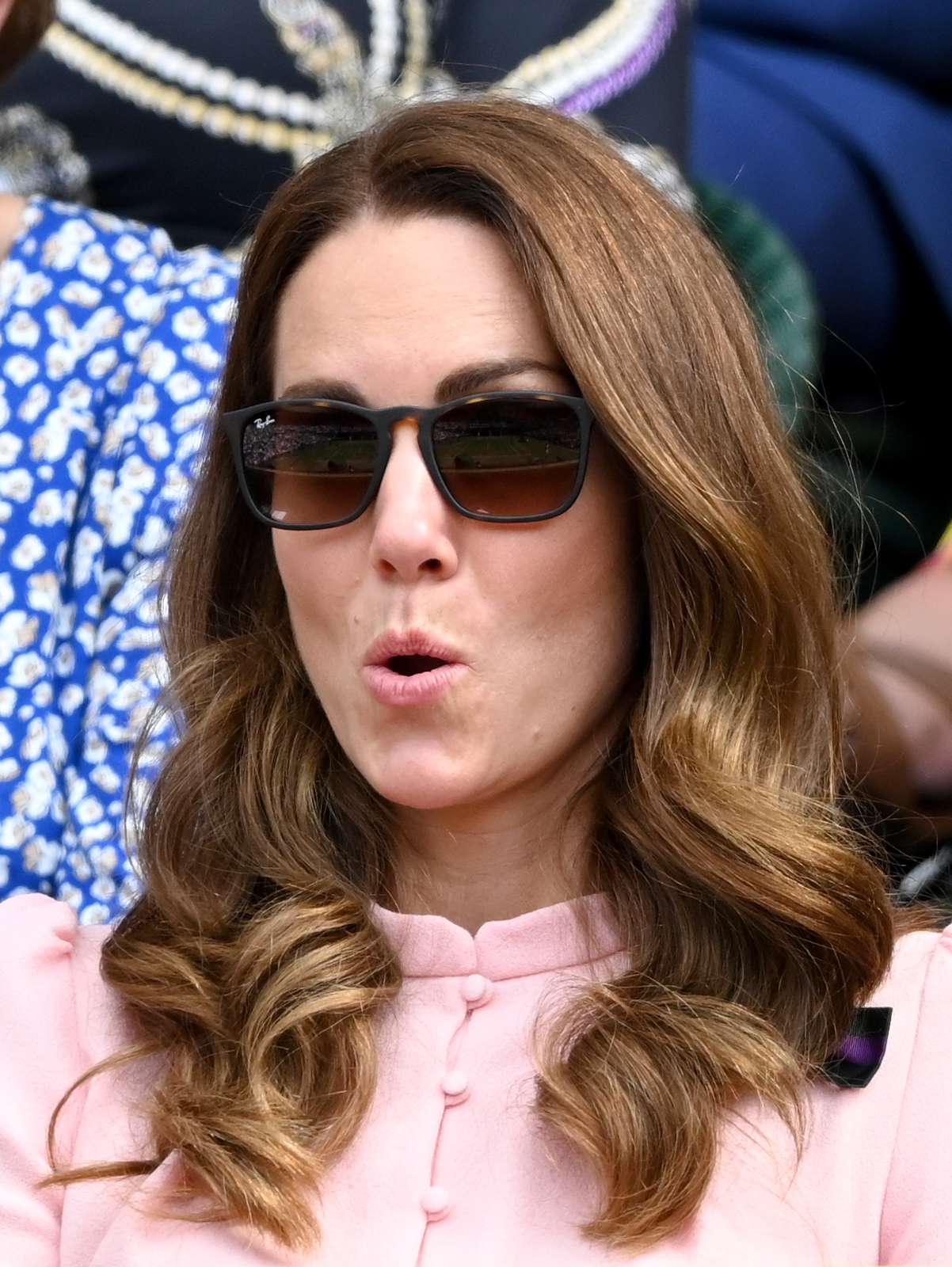 Princess Kate wearing sunglasses and gasping