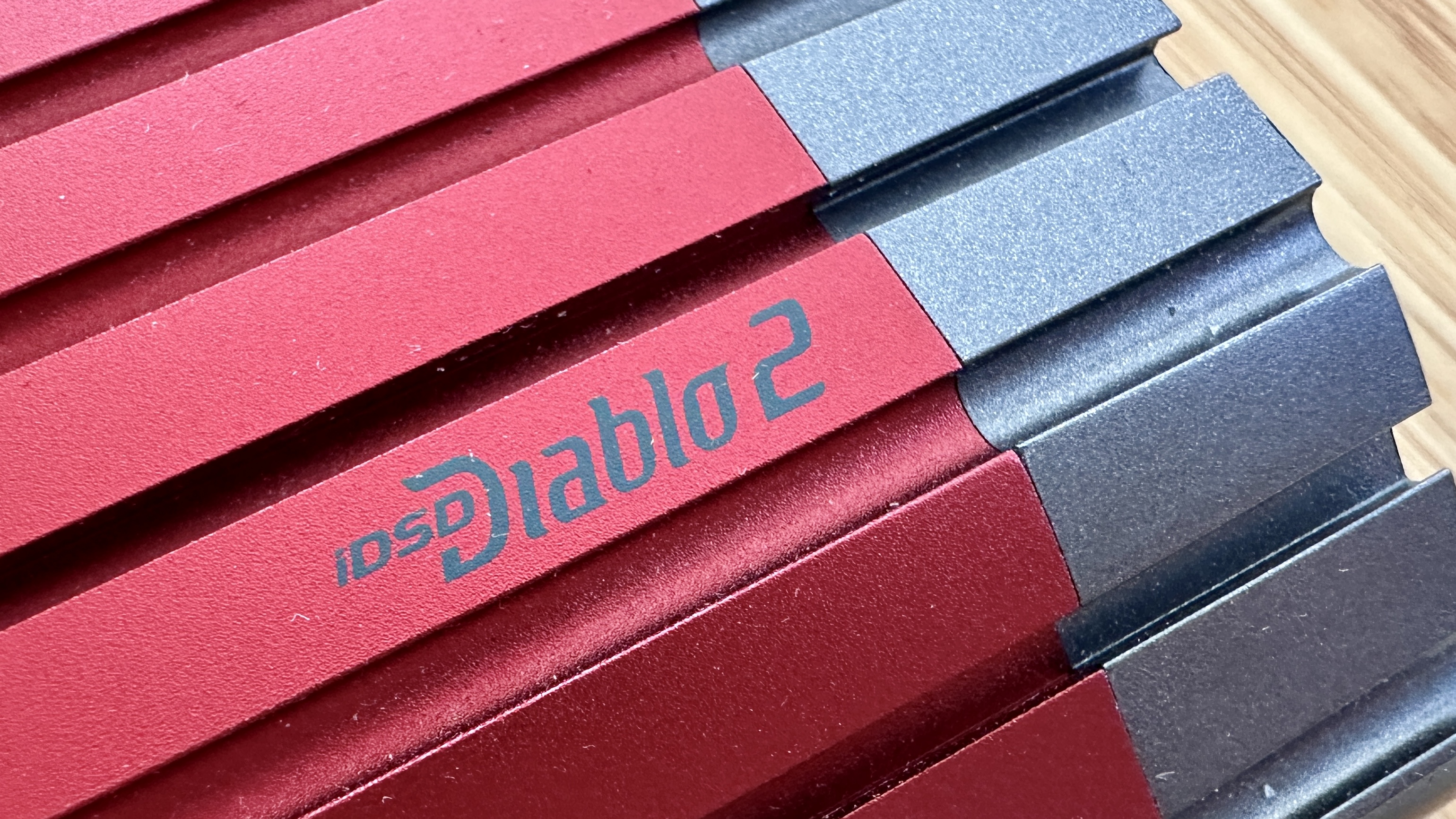 iFi iDSD Diablo of the branding on the casework, silver on red