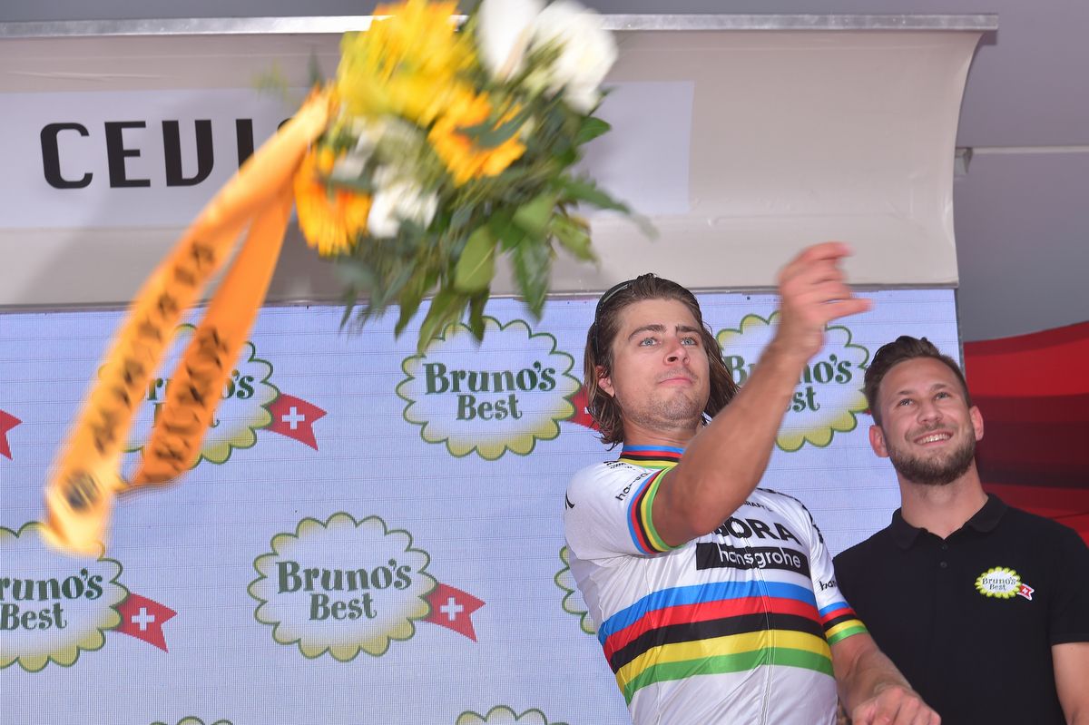 Peter Sagan (Bora-Hansgrohe) throws the bouquet