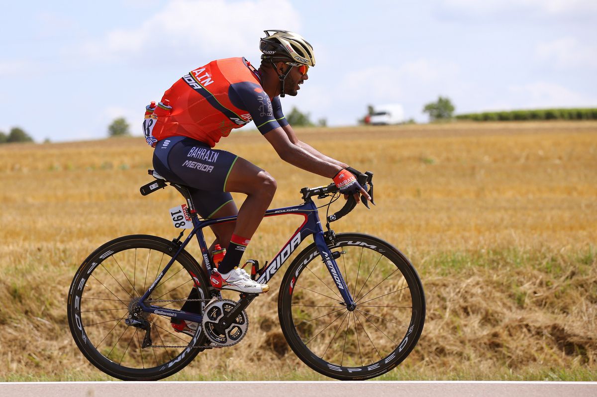 Tsgabu Grmay loaded up with bottles Bahrain-Merida
