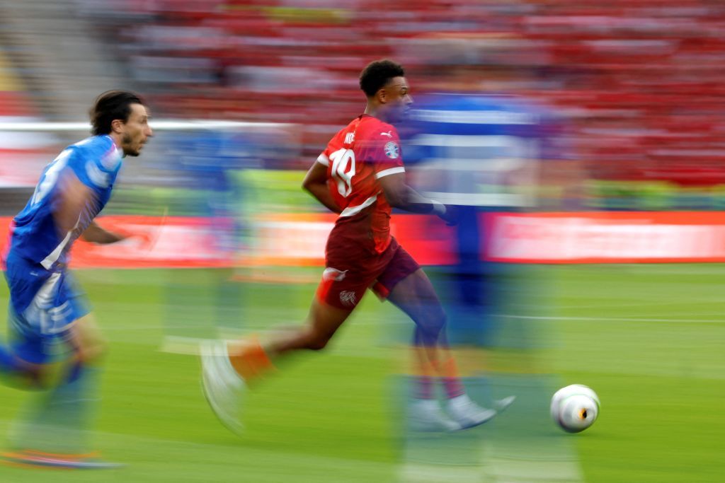 Switzerland&#039;s forward #19 Dan Ndoye runs with the ball during the UEFA Euro 2024 round of 16 football match between Switzerland and Italy at the Olympiastadion Berlin in Berlin on June 29, 2024