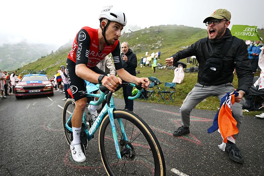 COURCHEVEL - COL DE LA LOZE, FRANCE - JULY 24: Kevin Vauquelin of France and Team Arkea - B&amp;amp;B Hotels competes climbing the Col de la Loze while fans cheer during the 112th Tour de France 2025, Stage 18 a 171.5km stage from Vif to Courchevel - Col de la Loze 2298m / #UCIWT / on July 24, 2025 in Courchevel - Col de la Loze, France. (Photo by Tim de Waele/Getty Images)