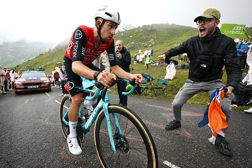 COURCHEVEL - COL DE LA LOZE, FRANCE - JULY 24: Kevin Vauquelin of France and Team Arkea - B&amp;amp;B Hotels competes climbing the Col de la Loze while fans cheer during the 112th Tour de France 2025, Stage 18 a 171.5km stage from Vif to Courchevel - Col de la Loze 2298m / #UCIWT / on July 24, 2025 in Courchevel - Col de la Loze, France. (Photo by Tim de Waele/Getty Images)