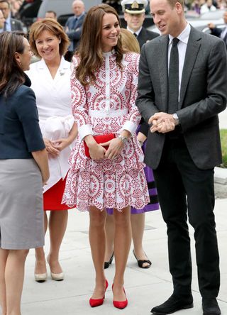 Kate Middleton wearing a white and red dress