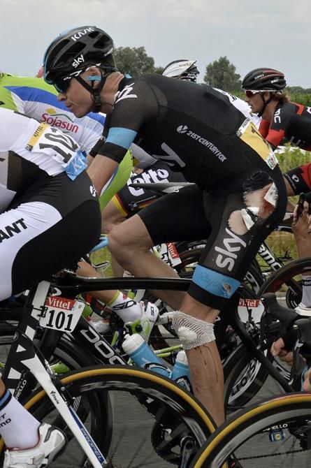 Team Sky's Chris Froome crashes during stage 4 at the Tour de France