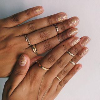 Gold nail polish design.