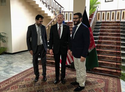 Former acting Pentagon chief Patrick Shanahan, Afghanistan's acting Defense Minister Asadullah Khalid and Afghan National Security Adviser Hamdullah Mohib.