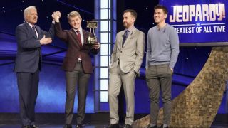 Alex Trebek, Ken Jennings, Brad Rutter and James Holzhauer in the Jeopardy Greatest of All Time Tournament.