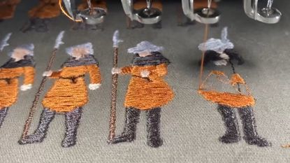 Scarlet Deer Inn knight figure embroidered on cloth
