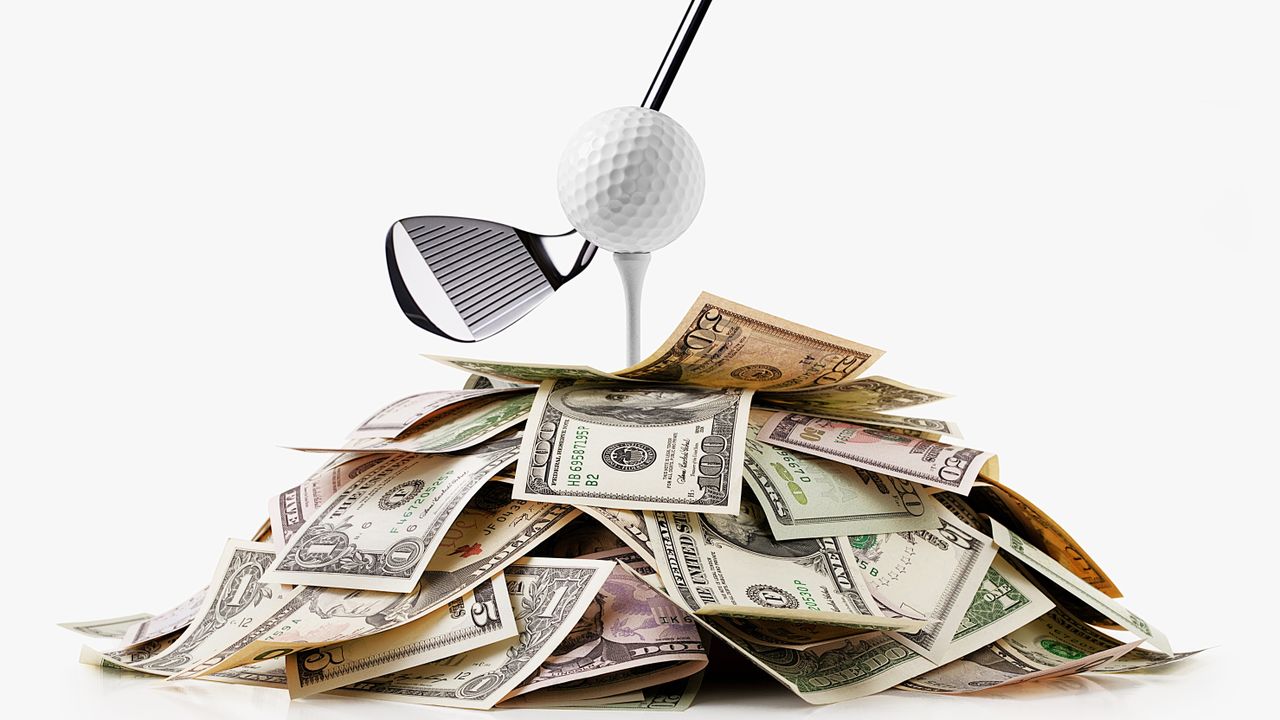 Creative image of teed-up golf ball and dollar bills