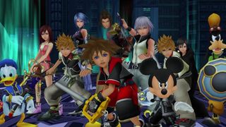 Screenshot from a Kingdom Hearts game showing Sora, Donald Duck, Goofy and a group of allied characters standing together in a dark, futuristic city setting.