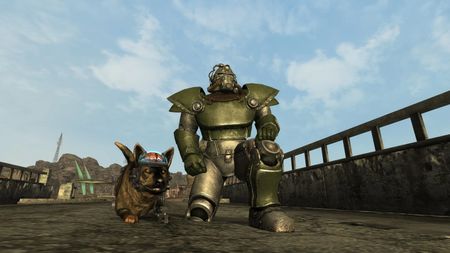 Power armour guy crouches with his dog.
