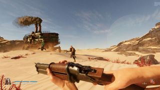 Screenshot from FPS SAND, showing a desert environment and a gun-wielding soldier running toward a walking base.