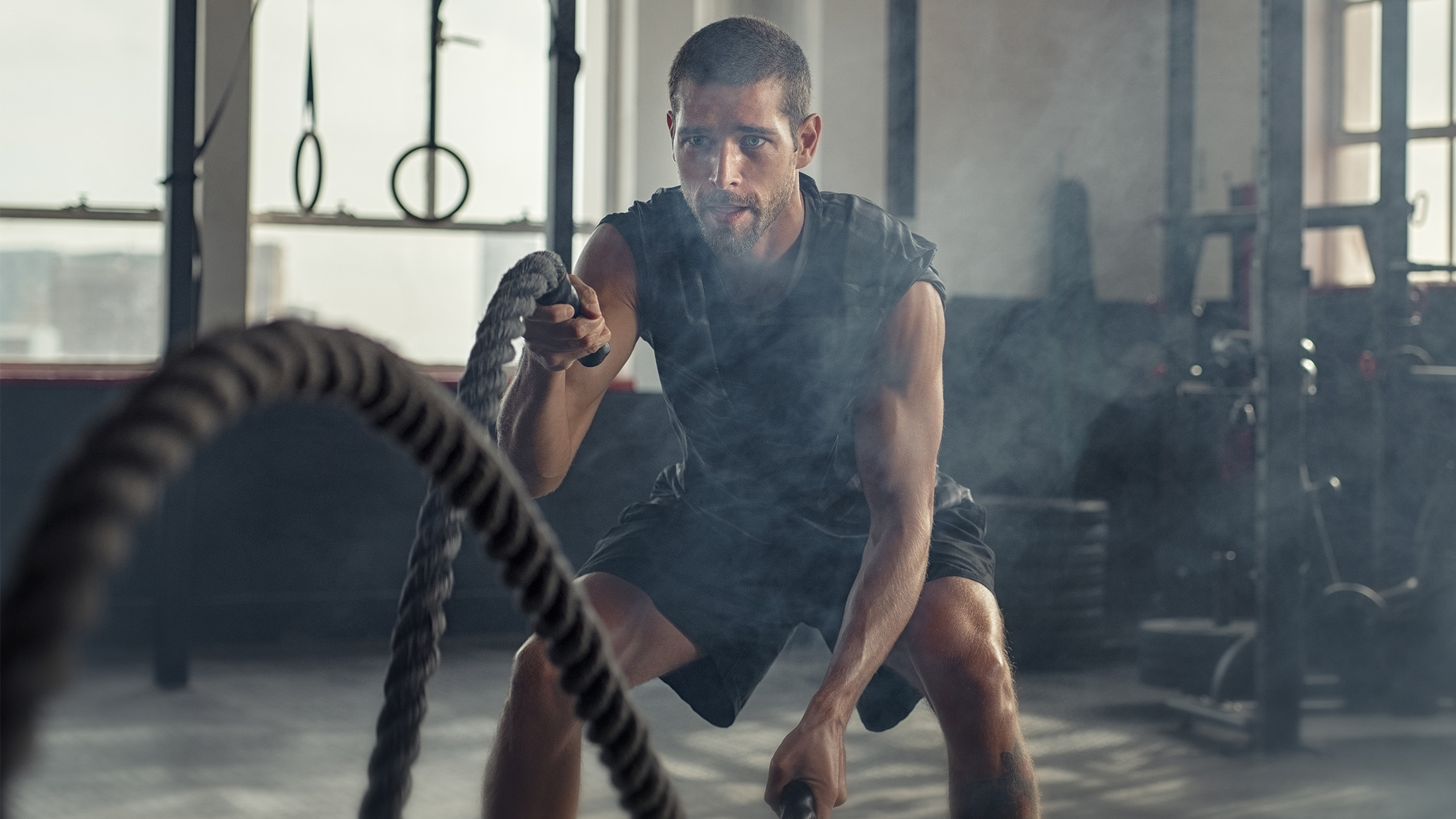 This 4-move battle rope workout sculpts functional muscle in under 25  minutes
