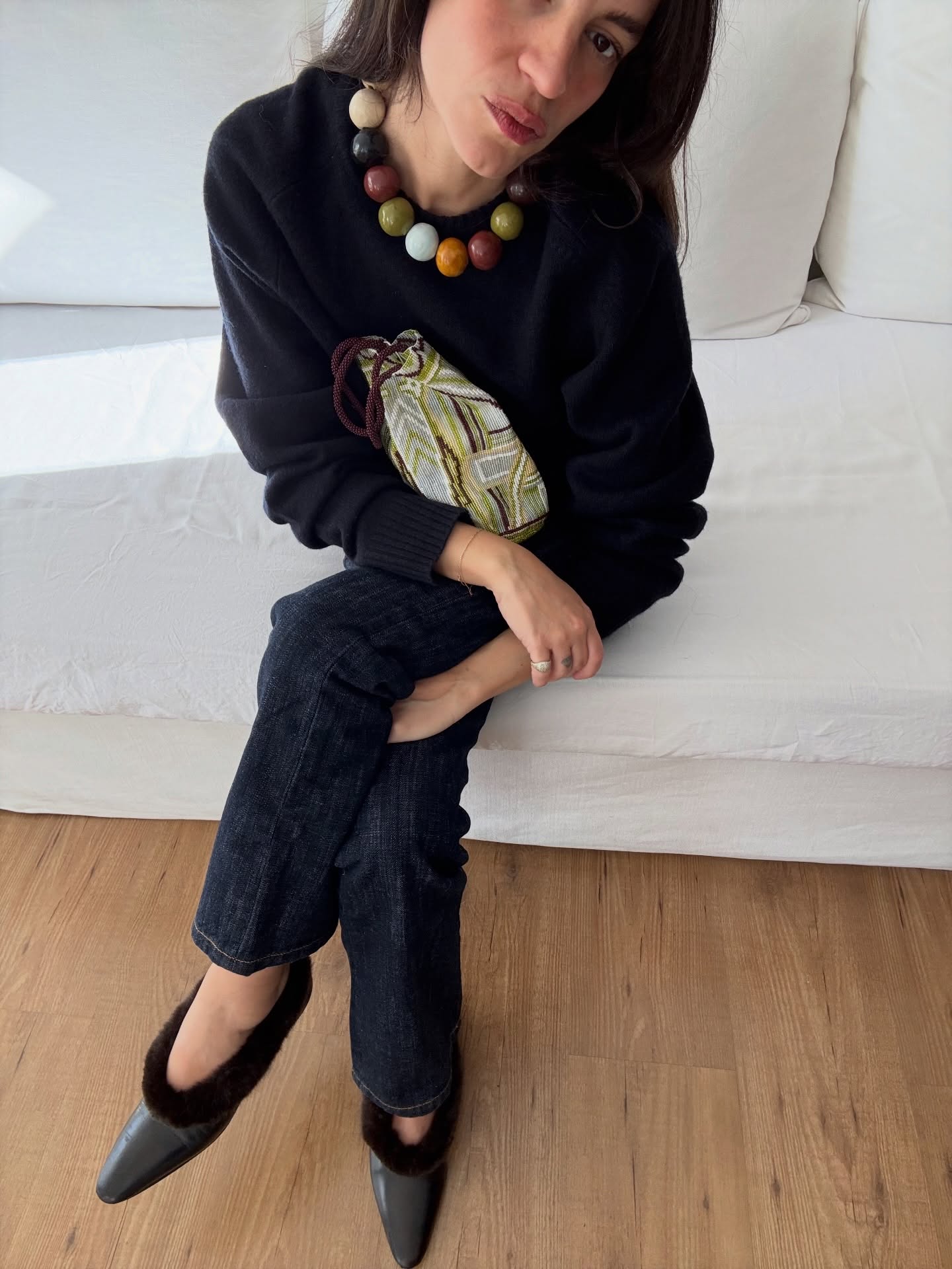 Diana Garcia Urbina wears dark indigo wash jeans