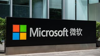 Microsoft logo and branding in English and Chinese pictured at the company's Beijing headquarters.