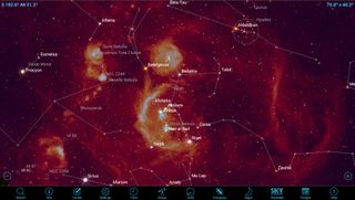 The SkySafari 5 app allows the background sky to be shown in different wavelengths of the electromagnetic spectrum, including H-alpha light, which reveals where the concentrations of hydrogen gas are. The large curved feature on Orion’s eastern flank is called Barnard’s Loop, part of a gigantic bubble of gas inflated by the recently formed stars in the Orion Nebula and Alnitak regions.