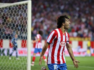 Sergio Aguero celebrates after scoring for Atletico Madrid against Schalke in 2008.