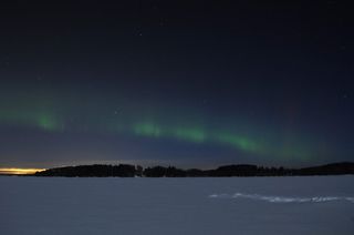 Finland was one of many places where photographers could take pictures of the aurora. Solar flares that cause auroras can act as a kind of explosion that sends streams of electrons and protons out into space. These electrons, protons and other particles a