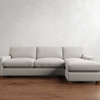 PB Comfort Modern Square Arm Chaise Sectional against a gray wall.