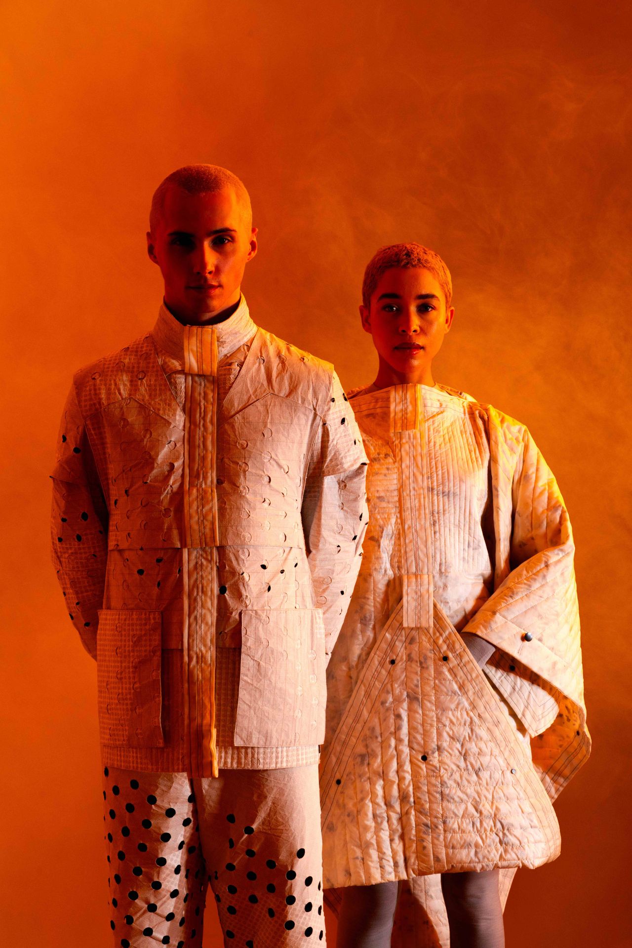 furniture, clothing and accessories on orange backdrop