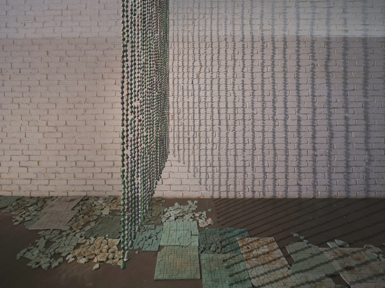 Beaded curtain art installation at Hong Kong gallery, part of group show, Soy Dreams of Milk