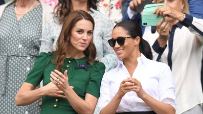 london, england july 13 catherine, duchess of cambridge and meghan, duchess of sussex in the royal box on centre court during day twelve of the wimbledon tennis championships at all england lawn tennis and croquet club on july 13, 2019 in london, england photo by karwai tanggetty images