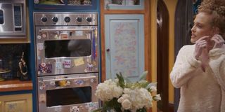 Taylor Swift's oven covered in magnets