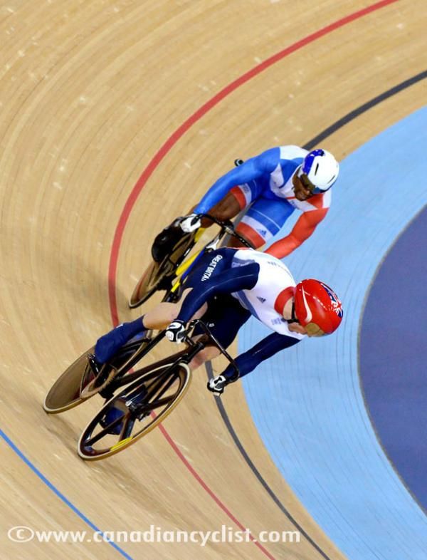 Kenny watches Bauge in the final of the men's sprint